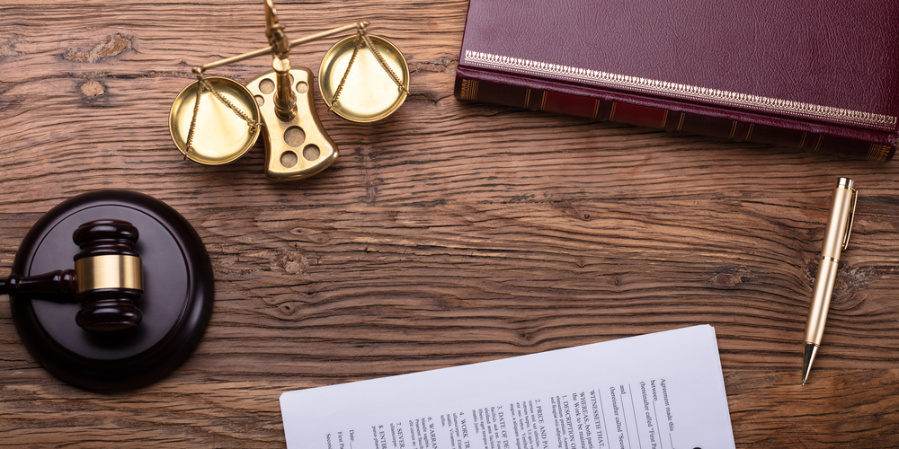 How to Successfully Communicate with Your Divorce Lawyer = Overhead View Of Judge Desk