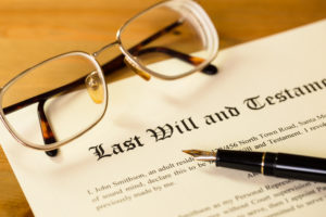 The Basics of Probate - Last will and testament with pen and glasses concept for legal d