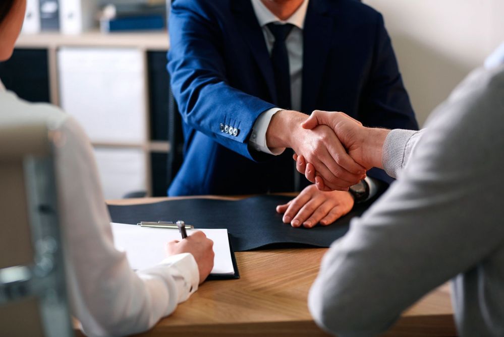 Common Estate Planning Questions - Pen laying on top of a Will for estate planning